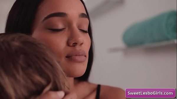 See this naughty blonde lesbo girl seduced by her natural busty ebony friend in the tub for a good fuck